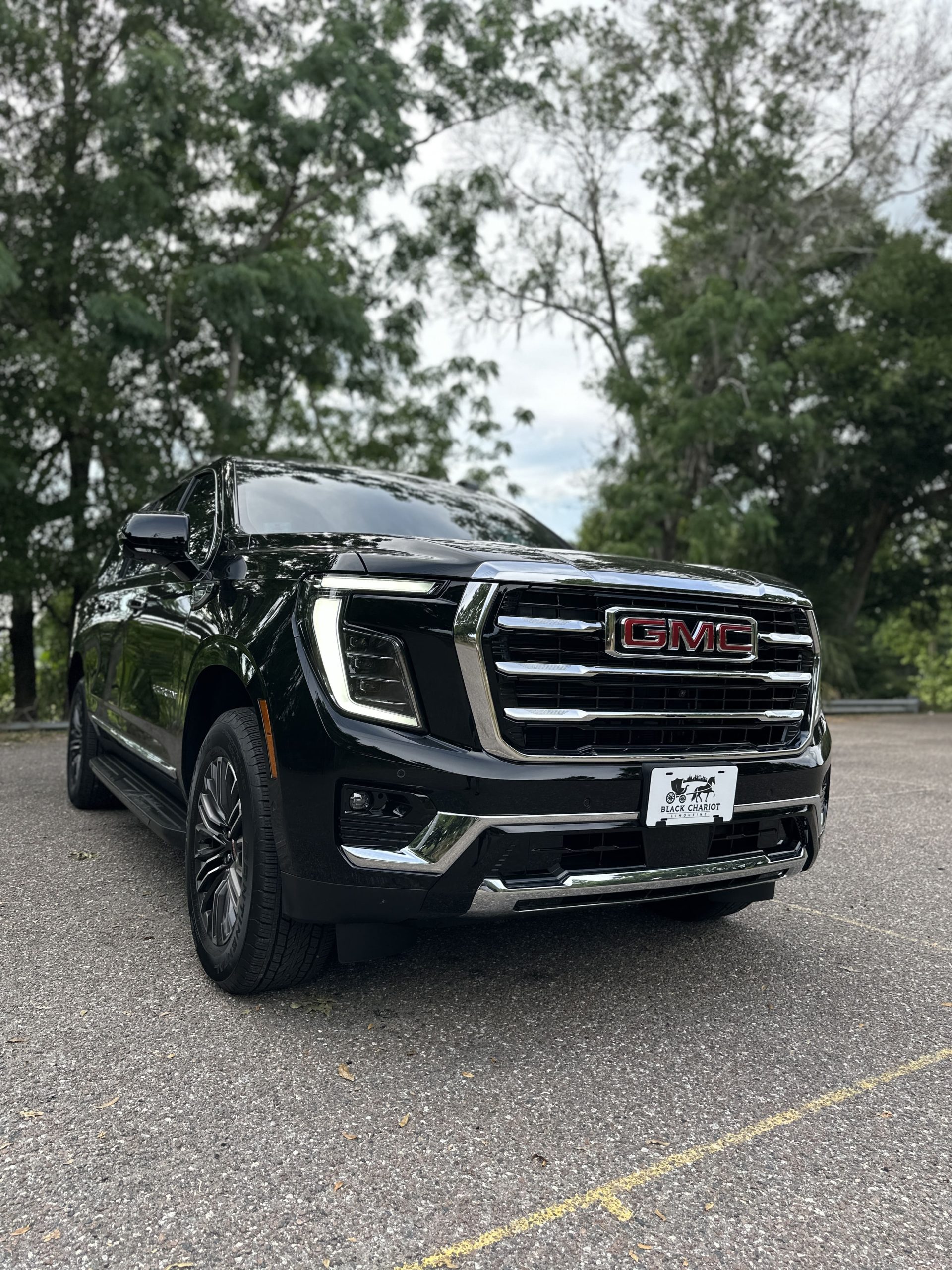 Luxury SUV — Chevrolet Suburban / GMC Yukon XL — Black Chariot Limousine Orlando